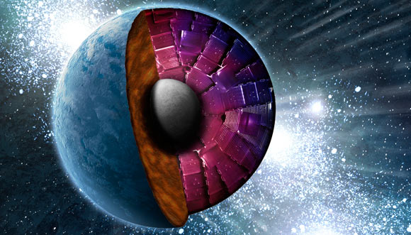 An artist’s conception of the cross section of a super-Earth with the National Ignition Facility target chamber superimposed over the mantle, looking into the core. Image credit: John Jett / Lawrence Livermore National Laboratory.