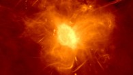 The complex, cirrus-like emission from the Galactic center super bubble dominates this MeerKAT image. This is traversed by the Radio Arc, a complex of many parallel radio filaments. The radio bubble nestles against the diffuse Sagittarius A region in the lower center of the image. The bright dot near the center of this region is Sagittarius A*. Image credit: I. Heywood, SARAO.