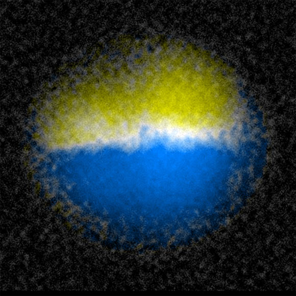 A ‘domain wall’ in this image is the lighter line between two groups of atoms. Image credit: Kai-Xuan Yao.