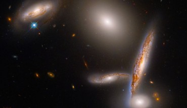This Hubble image shows HCG 40 (also known as Arp 321), an unusual close-knit collection of five galaxies in the constellation of Hydra. Image credit: NASA / ESA / Hubble / STScI.