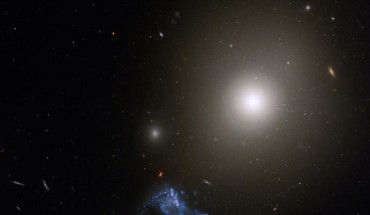This Hubble image shows the elliptical galaxy NGC 541 and a star-forming peculiar galaxy called Minkowski’s object. Image credit: NASA / ESA / S. Croft, Eureka Scientific Inc. / Gladys Kober, NASA’s Goddard Space Flight Center / Catholic University of America.