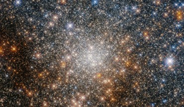 This Hubble image shows the globular cluster Terzan 9, a relic of a generation of long-lived stars that formed in the early Galaxy. The color image was made from separate exposures taken in the visible and infrared regions of the spectrum with Hubble’s Advanced Camera for Surveys (ACS) and Wide Field Camera 3 (WFC3). Three filters were used to sample various wavelengths. The color results from assigning different hues to each monochromatic image associated with an individual filter. Image credit: NASA / ESA / Hubble / R. Cohen.