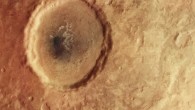 This image shows part of the scarred and colorful landscape in Aonia Terra, Mars. The image comprises data gathered by Mars Express’ High Resolution Stereo Camera (HRSC) on April 25, 2022. It was created using data from the nadir channel, the field of view aligned perpendicular to the surface of Mars, and the color channels of the HRSC. Image credit: ESA / DLR / FU Berlin.