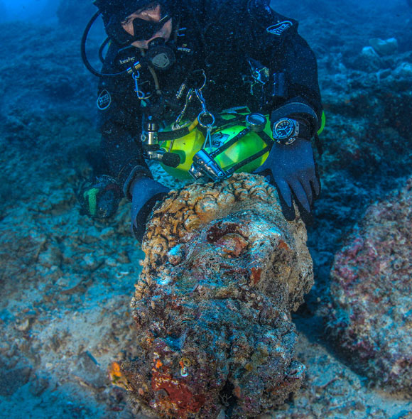 A head of a marble statue found at the Antikythera shipwreck. Image credit: Nikos Giannoulakis.