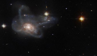 This Hubble image shows LEDA 17532, a multi-armed galaxy merger some 520 million light-years away in the constellation of Orion. Image credit: NASA / ESA / Hubble / W. Keel.