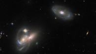 This Hubble image shows three galaxies LEDA 58109, SDSS J162558.14+435746.4, and SDSS J162557.25+435743.5. The color image is composed of infrared, optical and ultraviolet observations from Hubble’s Advanced Camera for Surveys (ACS), the Dark Energy Camera (DECam) on the Victor M. Blanco 4-m Telescope, and the Sloan Digital Sky Survey (SDSS). Nine filters were used to sample various wavelengths. The color results from assigning different hues to each monochromatic image associated with an individual filter. Image credit: NASA / ESA / Hubble / W. Keel.