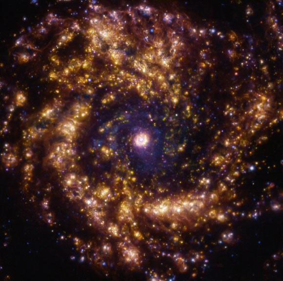 This image, taken by the Multi-Unit Spectroscopic Explorer (MUSE) instrument on ESO’s Very Large Telescope, shows Messier 61, a barred spiral galaxy located 52.5 million light-years away in the constellation of Virgo. The observations were done as part of the Physics at High Angular resolution in Nearby GalaxieS (PHANGS) project. Image credit: ESO / PHANGS.