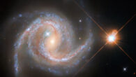 This Hubble image shows NGC 5495, a spiral galaxy some 319 million light-years away in the constellation of Hydra. The color image was made from separate exposures taken in the visible and infrared regions of the spectrum with Hubble’s Wide Field Camera 3 (WFC3). Five filters were used to sample various wavelengths. The color results from assigning different hues to each monochromatic image associated with an individual filter. Image credit: NASA / ESA / Hubble / J. Greene / R. Colombari.