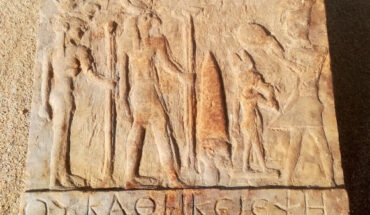 Stele with the scene of the falcon god and an inscription in Greek reading: ‘It is improper to boil a head in here. Image credit: Berenike Project / Sikait Project.