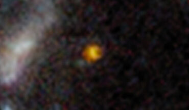 GLASS-z12 is captured in this Webb image of the outer regions of the galaxy cluster Abell 2744. Image credit: NASA / ESA / CSA / T. Treu, UCLA.