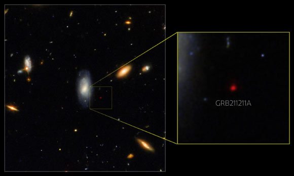 This Gemini North image, superimposed on an image taken with the NASA/ESA Hubble Space Telescope, shows the telltale near-infrared afterglow of a kilonova produced by GRB 211211A. Image credit: International Gemini Observatory / NOIRLab / NSF / AURA / M. Zamani / NASA / ESA.