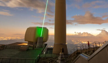 The 124-m-high telecommunication tower of Säntis in Switzerland; also shown is the path of the laser recorded with its second harmonic at 515 nm. Image credit: Houard et al., doi: 10.1038/s41566-022-01139-z.