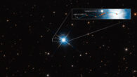 This image shows how microlensing was used to measure the mass of the white dwarf LAWD 37. The inset box plots how the dwarf passed in front of a background star in 2019. The wavy blue line traces the dwarf’s apparent motion across the sky as seen from Earth. Image credit: NASA / ESA / Peter McGill, UC Santa Cruz, IoA / Kailash Sahu, STScI / Joseph DePasquale, STScI.