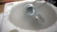 A jar with the medium-density amorphous ice inside, with steel balls and liquid nitrogen. Image credit: Rosu-Finsen et al., doi: 10.1126/science.abq2105.