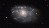 This Hubble image shows NGC 5486, an irregular spiral galaxy located 110 million light-years away in the constellation of Ursa Major. Image credit: NASA / ESA / Hubble / C. Kilpatrick.