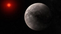 The TRAPPIST-1 system is remarkable for its seven planets that are similar in size, mass, density, and stellar heating to the rocky planets Venus, Earth, and Mars in our own Solar System. This illustration shows what the rocky planet TRAPPIST-1b could look like based on the new study. Image credit: NASA / ESA / CSA / J. Olmsted, STScI.