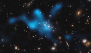 This image shows the Spiderweb protocluster, seen at a time when the Universe was only 3 billion years old. Image credit: ESO / Di Mascolo et al. / NASA / ESA / Hubble / H. Ford.