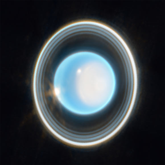 This image of Uranus, captured by Webb’s Near-Infrared Camera (NIRCam) on February 6, 2023, reveals stunning views of the planet’s rings. The planet displays a blue hue in this representative-color image, made by combining data from two filters (F140M, F300M) at 1.4 and 3 microns, which are shown here as blue and orange, respectively. Image credit: NASA / ESA / CSA / STScI / J. DePasquale, STScI.