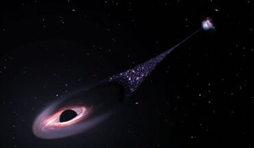 An artist’s impression of a runaway supermassive black hole that was ejected from its host galaxy as a result of a tussle between it and two other black holes. Image credit: NASA / ESA / Leah Hustak, STScI.