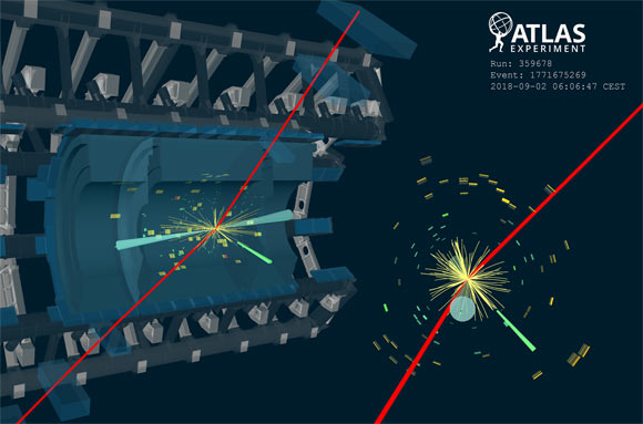 Event display of a candidate H→ Zγ event with the Z boson decaying μ+μ-. The transverse momenta of the two muon candidates, shown in red, are 72 GeV and 20 GeV. The photon candidate is reconstructed as an unconverted photon with a transverse momentum of 32.5 GeV. Two jets (R=0.4) are represented by light blue cones, with mjj of 965 GeV. The green boxes correspond to energy deposits in cells of the electromagnetic calorimeter, while yellow boxes correspond to energy deposits in cells of the hadronic calorimeter. The invariant mass of the Z boson candidate is 91.1 GeV and the invariant mass of Zγ system is 125.4 GeV. Image credit: ATLAS Collaboration / CERN.