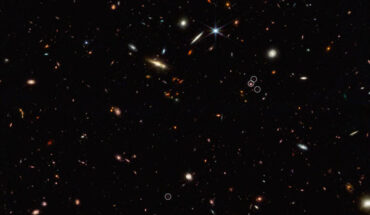 This deep galaxy field from Webb’s Near-Infrared Camera (NIRCam) shows an arrangement of 10 distant galaxies marked by eight white circles in a diagonal, thread-like line. Two of the circles contain more than one galaxy. This 3 million light-year-long filament is anchored by a very distant and luminous quasar. Ccalled J0305-3150, this quasar appears in the middle of the cluster of three circles on the right side of the image. Image credit: NASA / ESA / CSA / Feige Wang, University of Arizona.