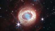 This image of SNR 1987A was taken with Webb’s Near-Infrared Camera. At the center, material ejected from the supernova forms a keyhole shape. Just to its left and right are faint crescents newly discovered by Webb. Beyond them an equatorial ring, formed from material ejected tens of thousands of years before the supernova explosion, contains bright hot spots. Exterior to that is diffuse emission and two faint outer rings. Image credit: NASA / ESA / CSA / M. Matsuura, Cardiff University / R. Arendt, NASA’s Goddard Spaceflight Center & University of Maryland, Baltimore County / C. Fransson.
