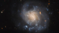 This Hubble image shows IC 1776, a barred spiral galaxy some 150 million light-years away in the constellation of Pisces. Hubble’s Wide Field Camera 3 (WFC3) snapped IC 1776 at a wide range of visible, and near-infrared wavelengths. Two filters were used to sample various wavelengths. The color results from assigning different hues to each monochromatic image associated with an individual filter. Image credit: NASA / ESA / Hubble / A. Filippenko.