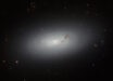 This Hubble image shows NGC 3156, a large lenticular galaxy some 73 million light-years away in the constellation of Sextans. The color image includes optical and near-infrared observations from Hubble’s Advanced Camera for Surveys (ACS) and Wide Field Camera 3 (WFC3) instruments. It is based on data obtained through three filters. The color results from assigning different hues to each monochromatic image associated with an individual filter. Image credit: NASA / ESA / Hubble / R. Sharples / S. Kaviraj / W. Keel.