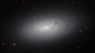 This Hubble image shows NGC 3156, a large lenticular galaxy some 73 million light-years away in the constellation of Sextans. The color image includes optical and near-infrared observations from Hubble’s Advanced Camera for Surveys (ACS) and Wide Field Camera 3 (WFC3) instruments. It is based on data obtained through three filters. The color results from assigning different hues to each monochromatic image associated with an individual filter. Image credit: NASA / ESA / Hubble / R. Sharples / S. Kaviraj / W. Keel.