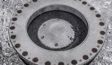 A view of the outside of the OSIRIS-REx sample collector. Sample material from asteroid Bennu can be seen on the middle right. Image credit: NASA / Erika Blumenfeld / Joseph Aebersold.