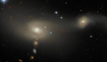 This Hubble image shows Arp-Madore 2105-332, a pair of interacting emission-line galaxies some 200 million light-years away in the constellation of Microscopium. Image credit: NASA / ESA / Hubble / J. Dalcanton / L. Shatz.