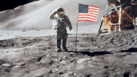 Astronaut David R. Scott, commander, gives a military salute while standing beside the deployed United States flag during the Apollo 15 lunar surface extravehicular activity (EVA) at the Hadley-Apennine landing site. The flag was deployed toward the end of EVA-2. The Lunar Module, ‘Falcon,’ is partially visible on the right. Hadley Delta in the background rises approximately 4,000 m (about 13,124 feet) above the plain. The base of the mountain is approximately 5 km (about three statue miles) away. This photograph was taken by astronaut James B. Irwin, lunar module pilot. While astronauts Scott and Irwin descended in the Lunar Module to explore the Moon, astronaut Alfred M. Worden, command module pilot, remained in lunar orbit in the Command and Service Modules. Image credit: NASA / JSC.