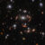 This Hubble image shows the galaxy cluster SDSS J1226+2152. Image credit: NASA / ESA / CSA / Webb / J. Rigby / JWST TEMPLATES Team.