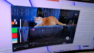 A computer screen shows Taters the cat in a still from the first high-definition streaming video to be sent via laser from deep space, as well as the incoming data stream delivering the frames from the video. Image credit: NASA.