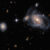 This Hubble image shows four spiral galaxies in the constellation of Horologium: the large, prominent spiral galaxy on the right side of the image is NGC 1356; the two apparently smaller spiral galaxies flanking it are LEDA 467699 (above it) and LEDA 95415 (very close at its left) respectively; and finally, IC 1947 sits along the left side of the image. Image credit: NASA / ESA / Hubble / J. Dalcanton, Dark Energy Survey / DOE / FNAL / NOIRLab / NSF / AURA / L. Shatz.