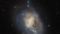 This Hubble image shows IC 3476, a dwarf spiral galaxy located 54 million light-years away in the constellation of Coma Berenices. This image is made up of observations from Hubble’s Advanced Camera for Surveys (ACS) in the near-infrared and optical parts of the spectrum. It is based on data obtained through two filters. The color results from assigning different hues to each monochromatic image associated with an individual filter. Image credit: NASA / ESA / Hubble / M. Sun.