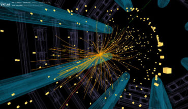 View of an ATLAS collision event in which a candidate W boson decays into a muon and a neutrino; the reconstructed tracks of the charged particles in the inner part of the ATLAS detector are shown as orange lines; the energy deposits in the detector’s calorimeters are shown as yellow boxes; the identified muon is shown as a red line; the missing transverse momentum associated with the neutrino is shown as a green dashed line. Image credit: ATLAS / CERN.