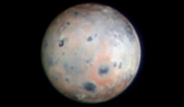 This image, taken by the SHARK-VIS camera on the Large Binocular Telescope on January 10, 2024, is the highest resolution image of Io ever obtained by an Earth-based telescope. The image combines three spectral bands -- infrared, red and green -- to highlight the reddish ring around the volcano Pele (below and to the right of the moon’s center) and the white ring around Pillan Patera, to the right of Pele. Image credit: INAF / Large Binocular Telescope Observatory / Georgia State University / SHARK-VIS@LBT / P.I.F. Pedichini / D. Hope / S. Jefferies / G. Li Causi.