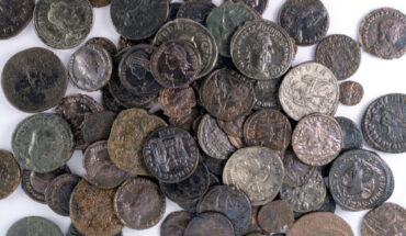 Bronze and silver coins from the 4th century CE found in Lod, central Israel. Image credit: Israel Antiquities Authority.