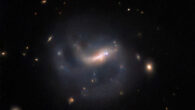 This Hubble image shows the barred spiral galaxy LEDA 857074. The color image is made up of observations from Hubble’s Wide Field Camera 3 (WFC3) in the near-infrared part of the spectrum. Four filters were used to sample various wavelengths. The color results from assigning different hues to each monochromatic image associated with an individual filter. Image credit: NASA / ESA / Hubble / R.J. Foley.