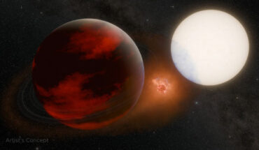 This artist’s concept depicts a potential volcanic exomoon between WASP-49Ab (left) and its parent star. Image credit: NASA / JPL / Caltech.
