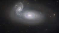 This Hubble image shows MCG+05-31-045, a pair of interacting galaxies some 390 million light-years away in the constellation of Coma Berenices. Image credit: NASA / ESA / Hubble / R.J. Foley, UC Santa Cruz.