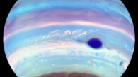 A false-color ultraviolet image of the entire planet, showing the hood or cap of hydrocarbon haze that covers the south pole; the edge of the north polar hood is visible at the top. Image credit: Troy Tsubota & Michael Wong, University of California, Berkeley.