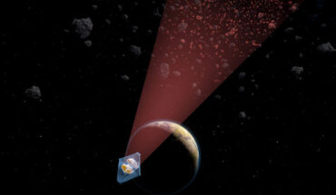 An artist’s illustration of Webb revealing, in the infrared, a population of main-belt decameter asteroids. Image credit: Ella Maru / Julien de Wit.