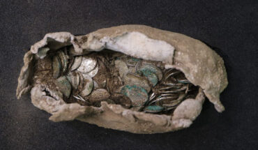 The 1,000-year-old silver coin hoard. Image credit: Oxford Cotswold Archaeology.