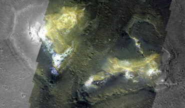 Two Martian mounds, rising hundreds of meters above the surrounding lowlands, display bright regions rich in clay minerals. Image credit: ESA / TGO / CaSSIS / NASA / JPL / MSSS / Murray Lab.