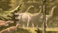 An artist’s impression of a herd of lithostrotian dinosaurs (right). Image credit: ABelov / CC BY 3.0.