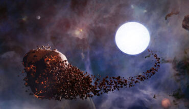 This artist’s impression shows an exoplanet (left) that has approached too close to a white dwarf (right) and been torn apart by tidal forces from the star. Image credit: NASA / CXC / SAO / M. Weiss.