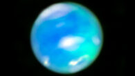 This composite image, made using data from the NASA/ESA Hubble Space Telescope and the NASA/ESA/CSA James Webb Space Telescope, shows auroral activity (cyan splotches) on Neptune. Image credit: NASA / ESA / CSA / STScI / Heidi Hammel, AURA / Henrik Melin, Northumbria University / Leigh Fletcher, University of Leicester / Stefanie Milam, NASA-GSFC.