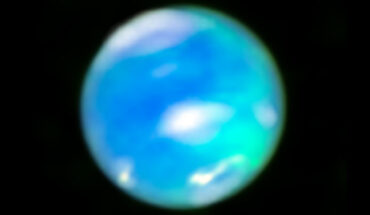 This composite image, made using data from the NASA/ESA Hubble Space Telescope and the NASA/ESA/CSA James Webb Space Telescope, shows auroral activity (cyan splotches) on Neptune. Image credit: NASA / ESA / CSA / STScI / Heidi Hammel, AURA / Henrik Melin, Northumbria University / Leigh Fletcher, University of Leicester / Stefanie Milam, NASA-GSFC.